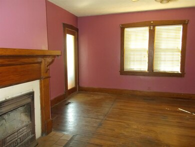 Bedroom downstairs with fireplace