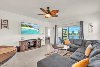 Tiled living area with a ceiling fan