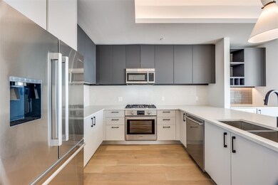 Kitchen with sink, appliances with stainless steel