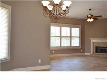 Open to the breakfast room and gathering room, the