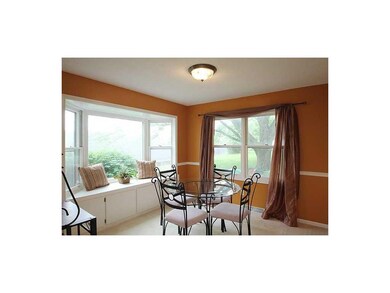 Dining Area. Bright, and cheery with large windows