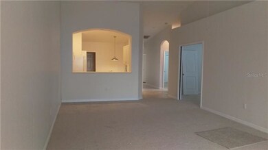 Huge vaulted great rm/dining room with plant shelv