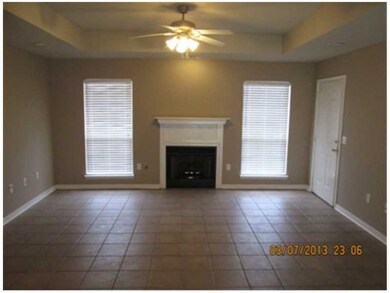 Living Room. New paint, recessed lighting and tray ceiling in this spacious living room.