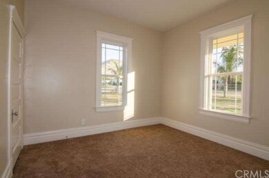 guest bedroom with large windows, original 1920 do