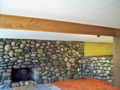 and stone half wall in dining area.