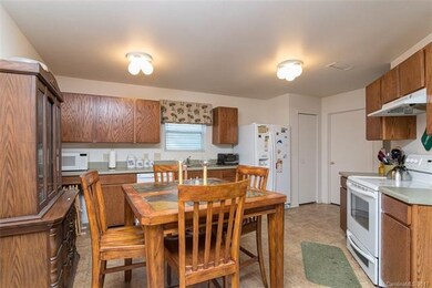 Kitchen offers plenty of cabinet storage and a pan