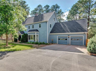 View of front of property with a front lawn and a 