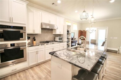 Kitchen featuring appliances with stainless steel finishes