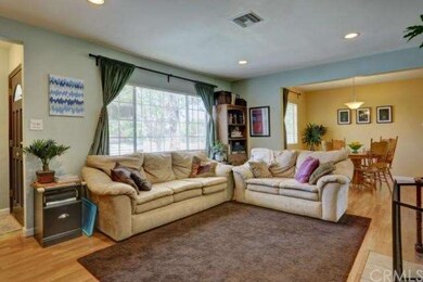 Spacious living room with laminate flooring