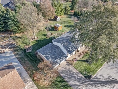 Aerial front view shows ample parking in addition 