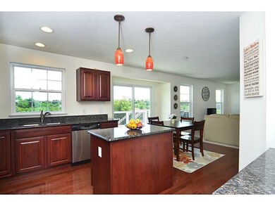 Kitchen. The kitchen includes hardwood floors and 