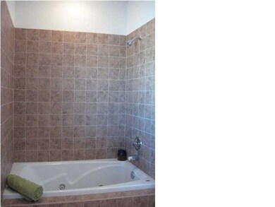 Master bath features a large walk-in closet!