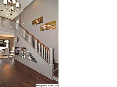 View toward the stairs when you walk in the front 