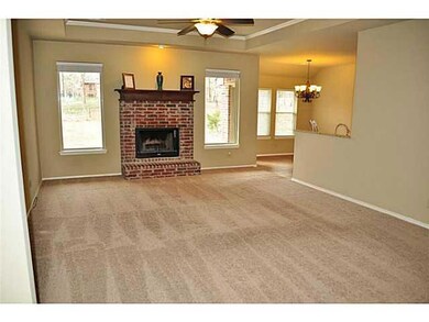 Living Room. Large living area boasting tray ceili