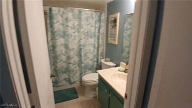 Master Bathroom with tub/shower ,patterened floor