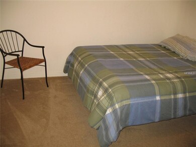 This bedroom is located separate from the master.