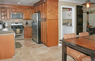 Completely Remodeled Kitchen Open to Dining Room