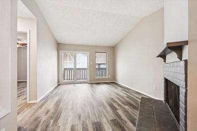 Large living area with balcony and a view