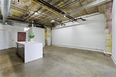 Garage featuring a sink