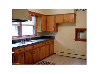 Ceramic kitchen flooring and newer laminate counte