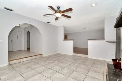 Sunken Living Room with wood burning fireplace and