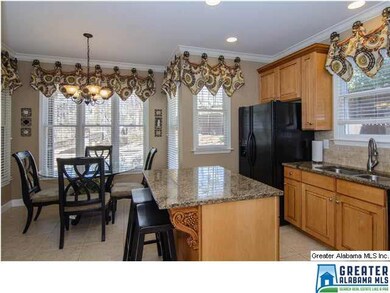 Updated kitchen with granite countertops, stone ba