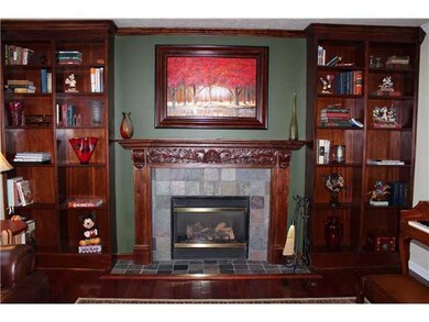 Living Room. Custom built mahogany mantle and book