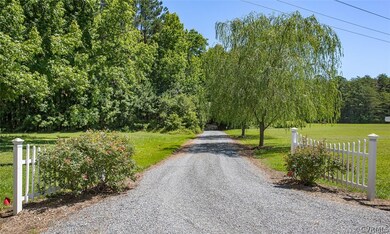 Long private driveway, house setting is very private.
