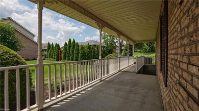 Wrap around porch. Stairs to walk-out basement