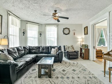 Incredible naturally lit living room with large wi