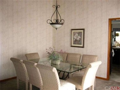 Friendly dining area adjacent to kitchen