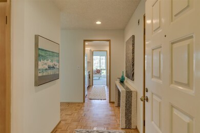 Formal entry with gorgeous refinished parquet floors.