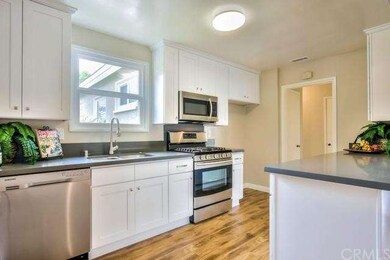 Remodeled kitchen with brand new cabinets, quartz 