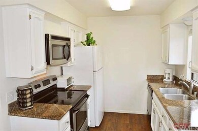 remodeled kitchen with granite counters, new appli