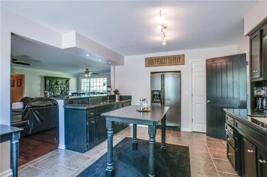 This Kitchen has it all...Granite, Pantry, Stainless Appliances, & open to Living Room.  Updated August 2013.
