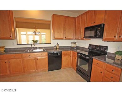 Kitchen - Kitchen with ceramic tile floor, maple c