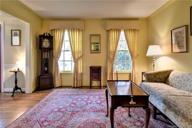 Formal Living Room with hardwood floors.