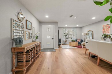 Entryway with recessed lighting, visible vents, li