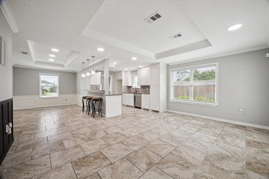 Spacious, open-concept kitchen and living area wit