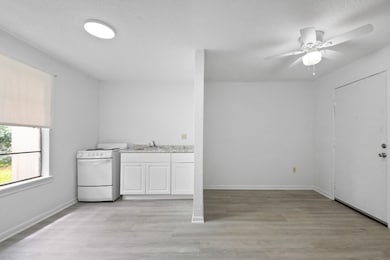 This photo showcases a bright, minimalist room wit