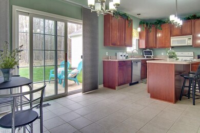 Spacious eat in kitchen with large Island for bar 