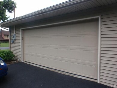 Attached 2 car garage, note update garage door and