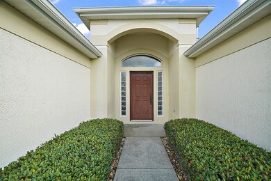 Covered front entrance with elegant door