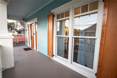 Front porch w/ swing, hardwood shutters