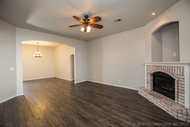 Graceful archway opens to Formal Dining Room ideal