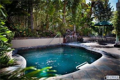 Pool is 6.5 ft deep and self cleaning