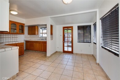 The kitchen is open to the dining room.