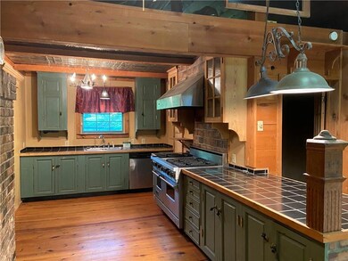 Large kitchen with stainless steel appliances and
