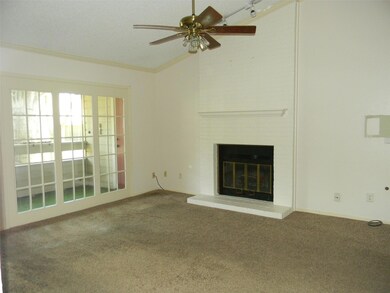 Unfurnished living room with vaulted ceiling, crow