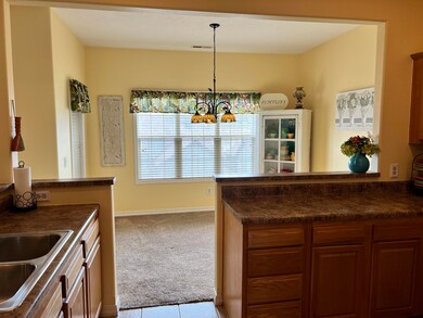 Kitchen View to Dining Area